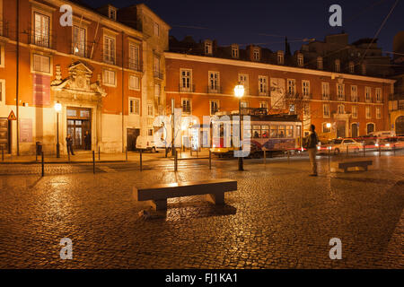 Portugal, city of Lisbon by night, Museum of Decorative Arts, square and tram at Portas do Sol street Stock Photo
