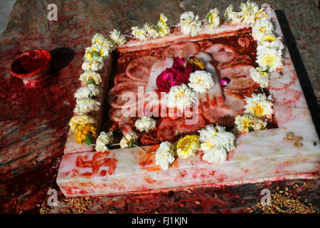 Marble sculpture of the Feet of Lord Vishnu, Jagdish Temple, Udaipur, Rajastan, India Stock Photo