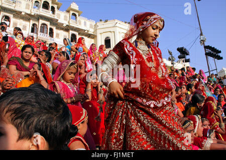 Colorful crowd of women during Gangaur festival in Udaipur , India Stock Photo