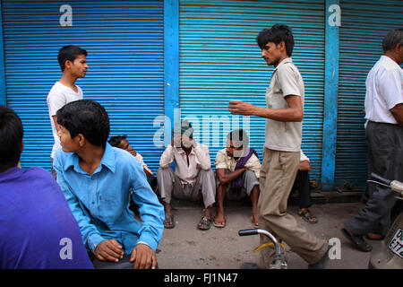 Men walk in a street of Old Delhi, India Stock Photo