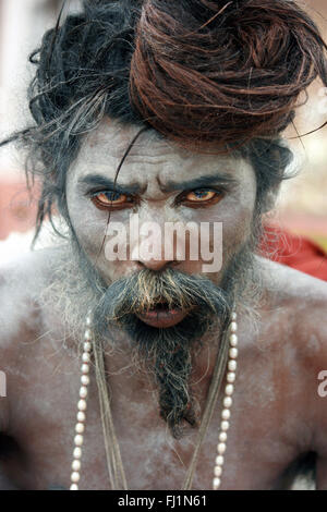 Sadhu -  Indian Hindu holy man saint  - covered with ashes - Varanasi  India Stock Photo