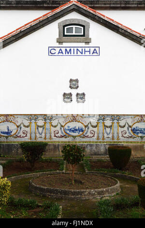 Ceramic tiles or azulejos on wall of railway station, Caminha, Minho Province, northern Portugal Stock Photo