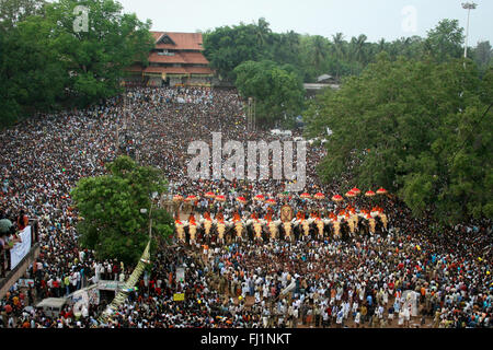 Crowd with elephants during Pooram festival in Thrissur, Kerala, India Stock Photo