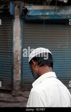 Muslim man with traditional Islamic hat cap (Taqiyah) in Kolkata Stock Photo