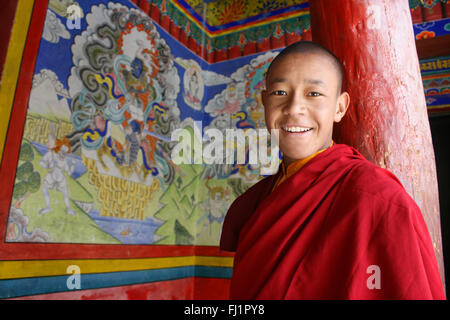 Smiling buddhist monk novice in Hemis monastery , Ladakh, India Stock Photo