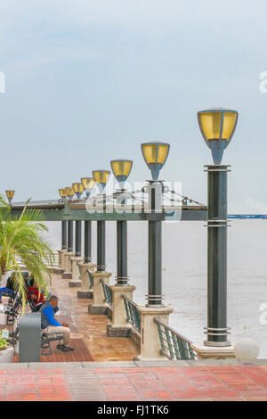 GUAYAQUIL, ECUADOR, OCTOBER - 2015 - Group of people at the modern Puerto Santa Ana boardwalk in Guayaquil, Ecuador Stock Photo