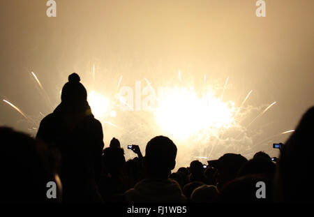 People watching the New Year's Fireworks in Zurich, Switzerland Stock Photo