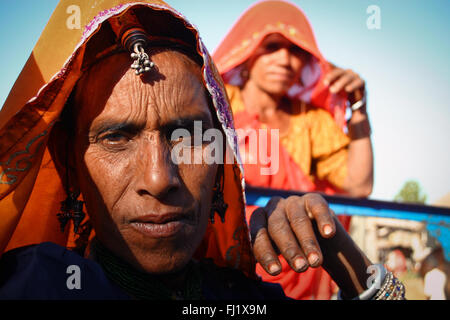 Portrait of Indian hindu tribal Thar desert women during  Pushkar camel fair in Rajasthan, India Stock Photo