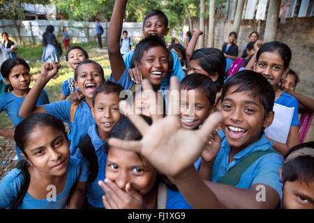 A group of kids go crazy after school in Sreemangal Bangladesh Stock Photo