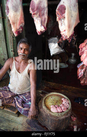 Butcher in Dhaka, Bangladesh Stock Photo