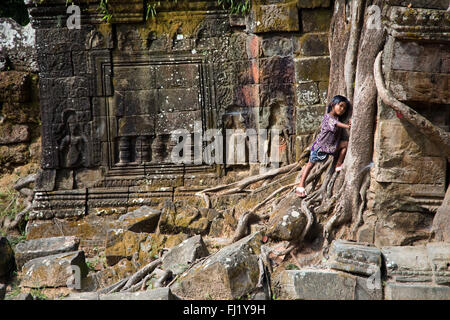 Young girl Ta Prohm, Siem Reap , Cambodia Stock Photo