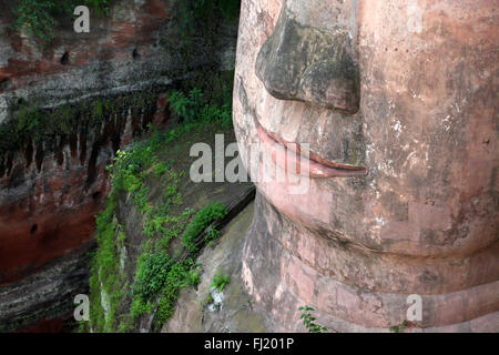 Close up on mouth of Leshan Giant Buddha , Sichuan , China Stock Photo