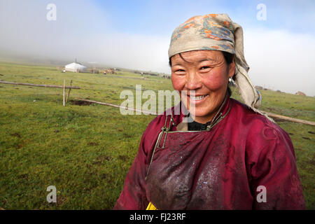 Portrait of Mongolian woman with traditional costume dress called 'deel' Stock Photo