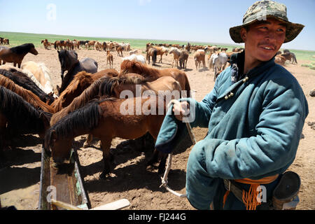 Portrait of Mongolian man with traditional dress clothes called 'deel' Stock Photo