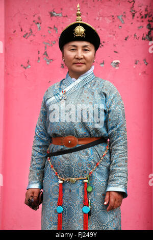 Portrait of Mongolian woman with traditional costume dress called 'deel' Stock Photo