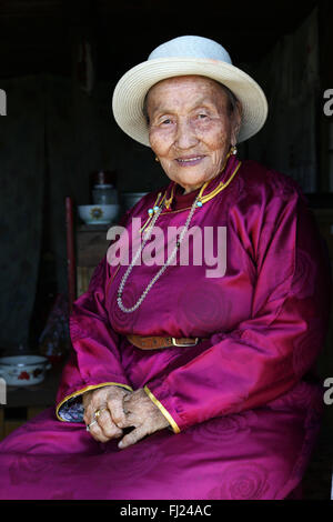 Portrait of Mongolian woman with traditional costume dress called 'deel' Stock Photo