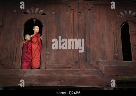 Buddhist monks novices in Nyaung Shwe monastery, Myanmar Stock Photo