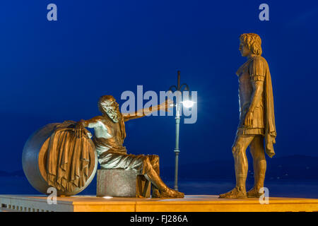 Alexander the Great meets cynic philosopher Diogenes. A public sculpture at the Greek city of Corinth. Stock Photo