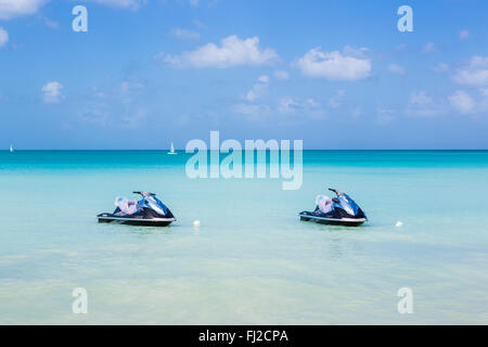 Two Yamaha jetski boats moored at Dickenson Bay, north Antigua, Antigua and Barbuda, West Indies Stock Photo