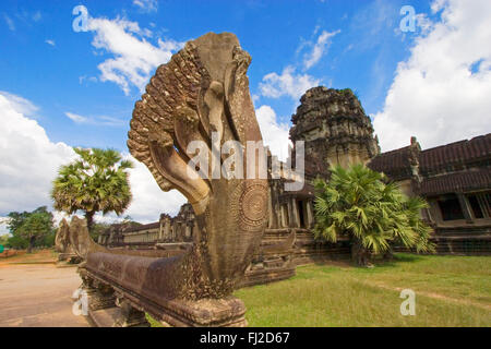 Entry to Angkor Wat with nagas (snakes), built in the 12th century by Suryavarman the 2nd, is the premier example of classical K Stock Photo