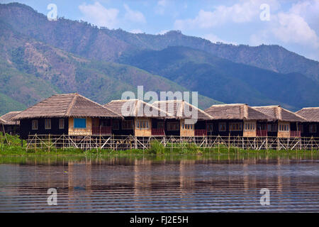 SKY LAKE RESORT consists of individual bungalos built on stilts on INLE LAKE - MYANMAR Stock Photo