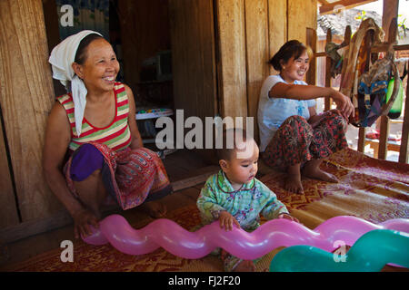 Three generations share a house in a SHAN VILLAGE near KENGTUNG also known as KYAINGTONG - MYANMAR Stock Photo