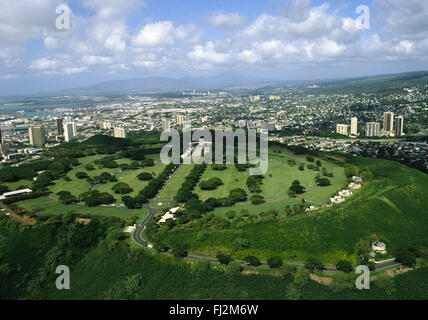 HONOLULU and the NATIONAL CEMETERY by helicopter - OAHU, HAWAII Stock Photo