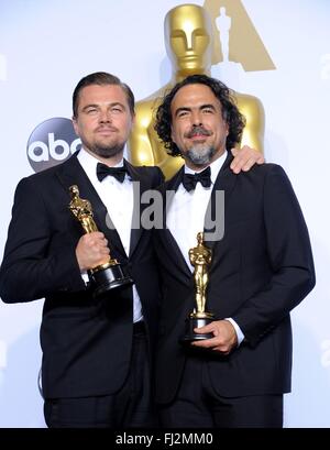 Los Angeles, CA, USA. 28th Feb, 2016. Leonardo DiCaprio, Best Actor, Alejandro Gonzalez Inarritu, Best Director in the press room for The 88th Academy Awards Oscars 2016 - Press Room, The Dolby Theatre at Hollywood and Highland Center, Los Angeles, CA February 28, 2016. Credit:  Elizabeth Goodenough/Everett Collection/Alamy Live News Stock Photo