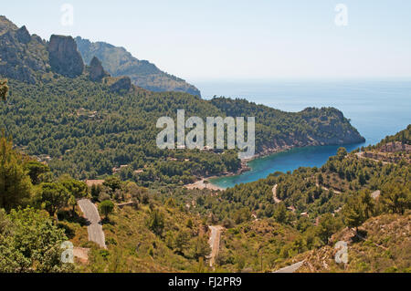 Mallorca, Balearic Islands, Spain: the winding road leading in Cala Tuent, a remote beach at the foot of the mountain range of the Serra de Tramuntana Stock Photo