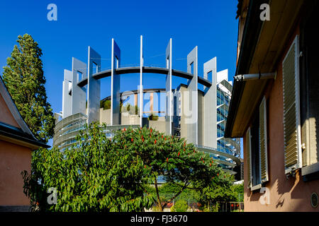 Cottage garden and Louise Weiss building, European Parliament, Strasbourg, Alsace, France, Europe Stock Photo