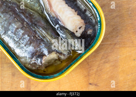 A macro image of canned, ready to eat, Moroccan Sardines in Sunflower oil presented in it's opened tin.