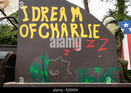 War and peace show, England. Vietnam war re-enactment. Cartoon on side of truck. 'I dream of Charlie' with sleeping marine. Stock Photo