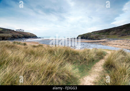 A cloudy day at Poldhu Cove near Mullion on the Lizard peninsula in Cornwall Stock Photo