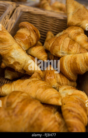 croissants in a wicker basket Stock Photo