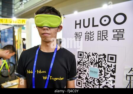 Beijing, China. 29th February, 2016. Young maker Wang Lei shows an intelligent patch during the 17th China Hi-tech Fair in Shenzhen, south China's Guangdong Province, Nov. 17, 2015. By encouraging mass entrepreneurship and innovation, China saw a record startup boom in 2015 as a total of 4.44 million companies were established, up 21.6 percent from a year ago. More than 80 percent of the new firms were in tertiary industries. The boom came after government efforts to encourage people to open their own businesses, including easier market entry, less red tape and tax breaks. Stock Photo