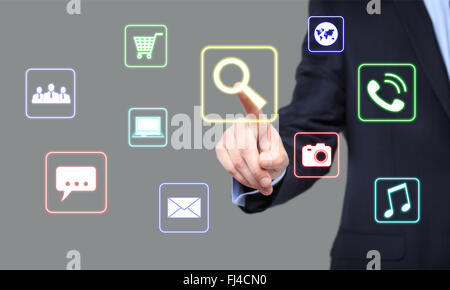 business, technology and internet concept - businessman pressing Search button on virtual screens Stock Photo