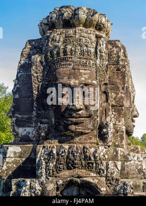 Faces of Bodhisattva Avalokiteshvara at Prasat Bayon. The Bayon  is a well-known and richly decorated Khmer temple at Angkor in Stock Photo