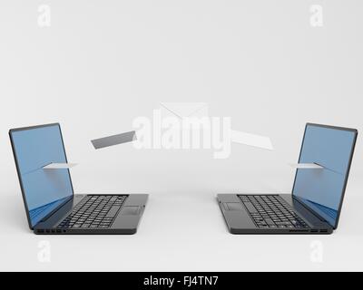 two laptops communicating mails with envelopes in a white 3d stage. Stock Photo