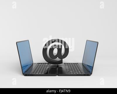 two laptops communicating with at symbol above  in a white 3d stage. Stock Photo