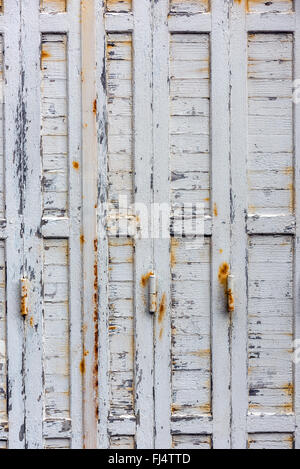 window with closed beige wooden shutters. background photo Stock Photo