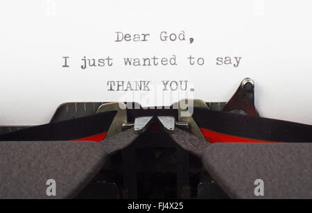 Words 'Thank You' to God on old typewriter. Letter to God. Stock Photo