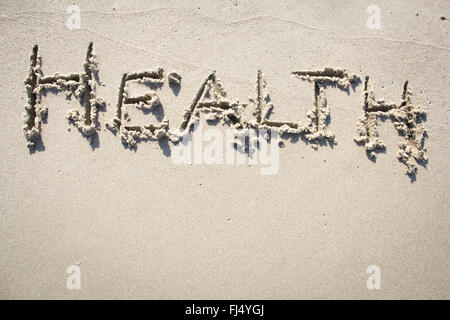 'Health' written in sand Stock Photo