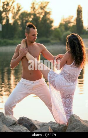 Young couple dancing in the park Stock Photo