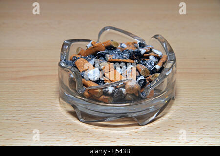 ashtray full of cigarette stubs Stock Photo