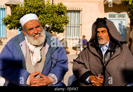 two native old men in traditional clothing, Tunisia Stock Photo