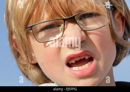 little boy with the second incisors, permanent dentition, portrait of a child Stock Photo