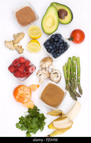 An assortment of healthy, fresh foods on a white background. Stock Photo