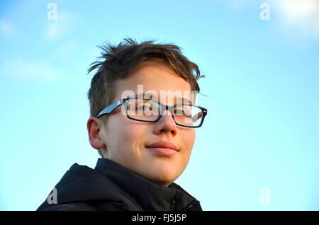 smiling boy with glasses, portrait of a child Stock Photo