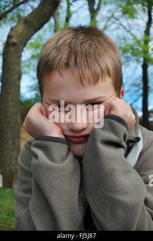 grumpy boy, portrait of a child, Germany Stock Photo