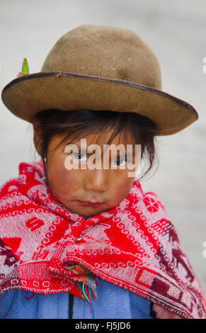 little girl in tradiotional clothing, portrait of a child, Peru, Pisaq Stock Photo